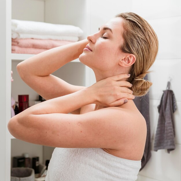 Woman in towel medium shot