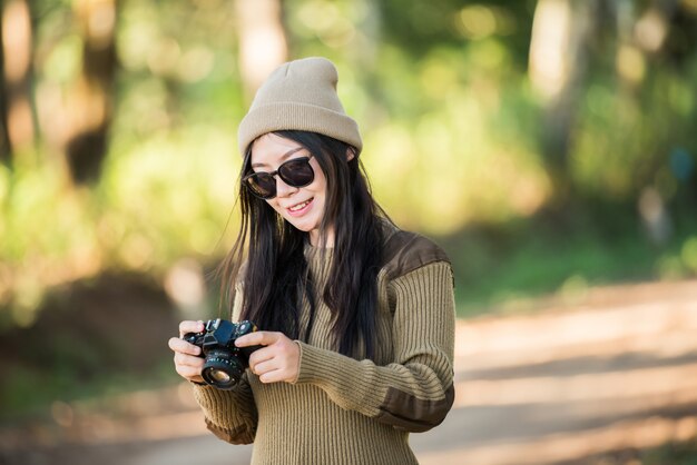 woman traveler going alone in the forest