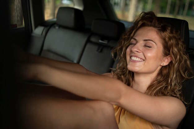 Woman traveling with her car