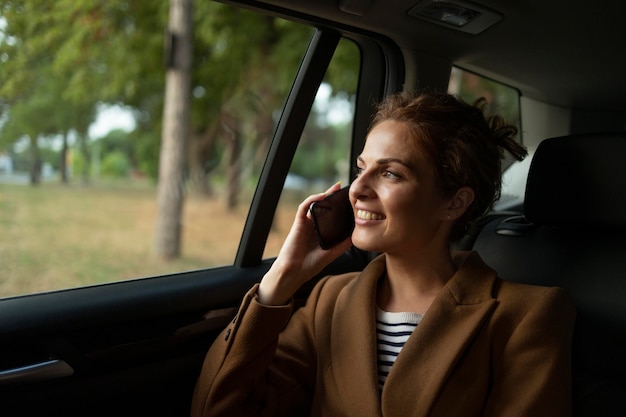 Woman traveling with her car