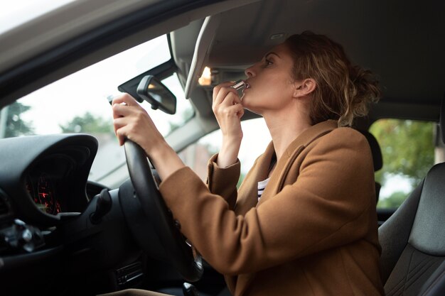 Woman traveling with her car