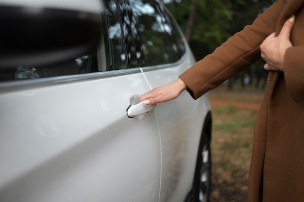 Woman traveling with her car