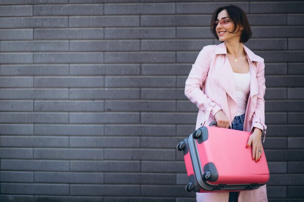 Woman travelling pink bag