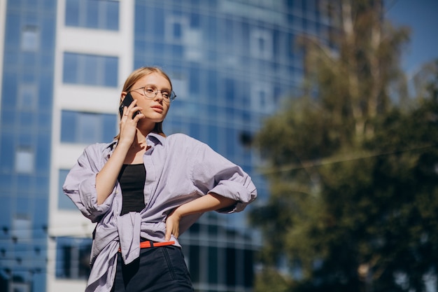 Woman travelling, and using phone