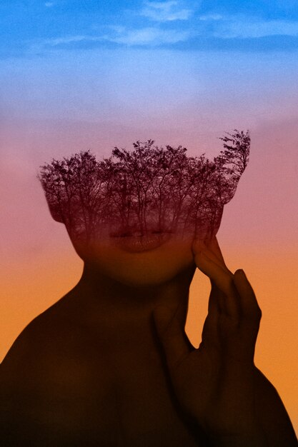 Woman and trees double exposure