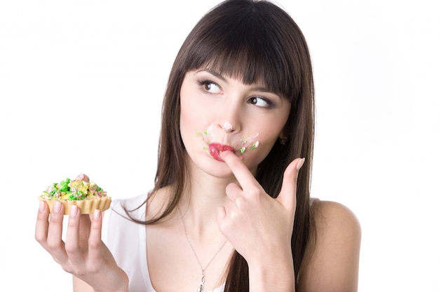 Woman trying a cake