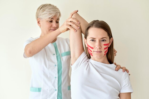 Woman undergoing therapy with physiologist