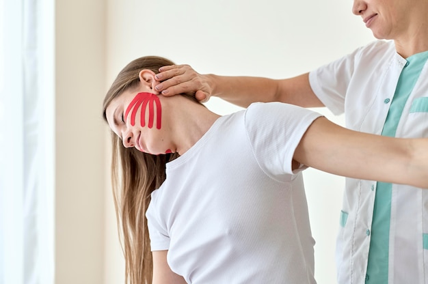 Woman undergoing therapy with physiologist