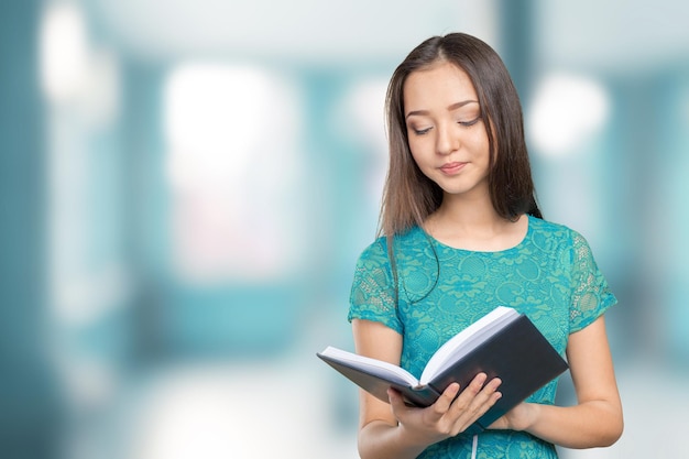 Woman university  college student holding book