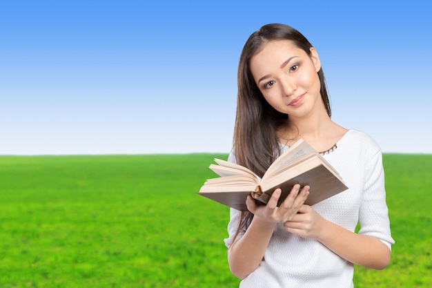 Woman university  college student holding book