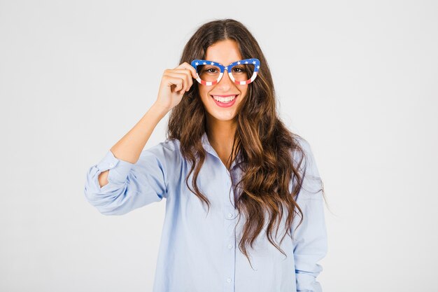 Woman in USA flag glasses