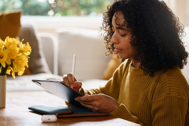 Woman using digital tablet technology