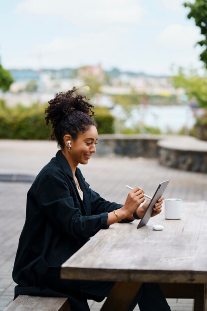 Woman using digital tablet technology