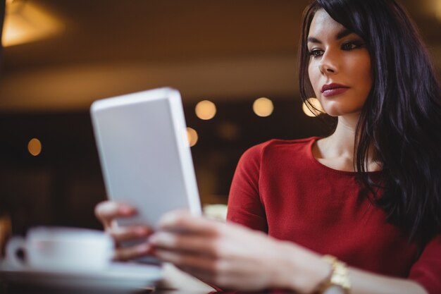 Woman using digital tablet