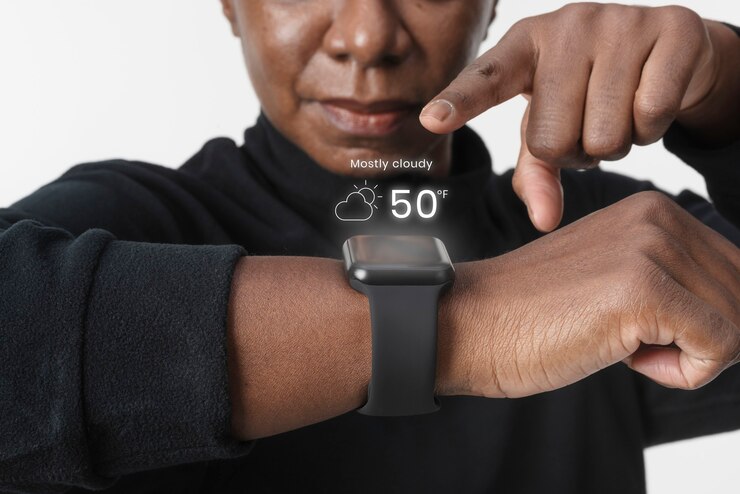 Free Photo woman using holography from smartwatch wearable technology
