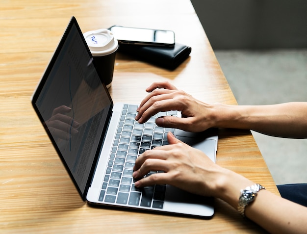 Woman using a laptop at work