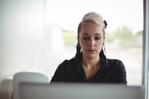 Woman using laptop