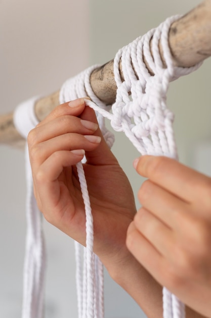 Woman using the macrame technique