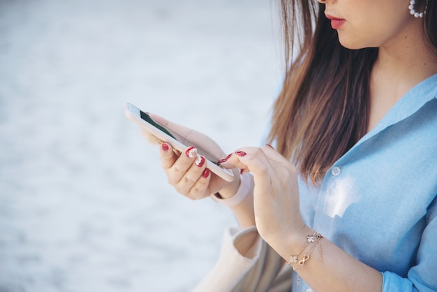 Woman using mobile phone