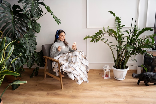 Woman using smartphone as a habit