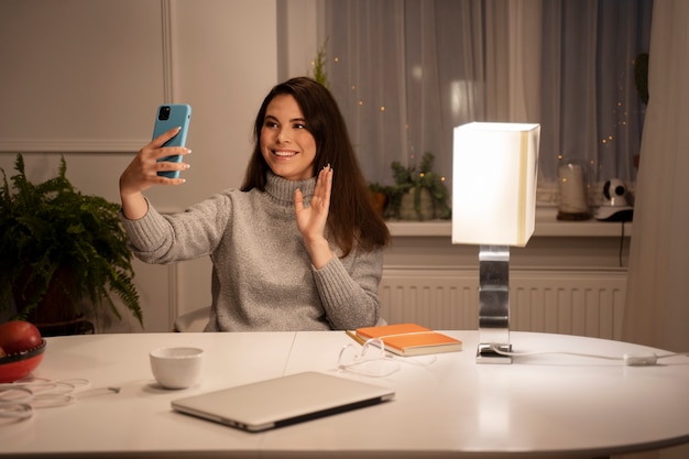 Woman using smartphone as a habit