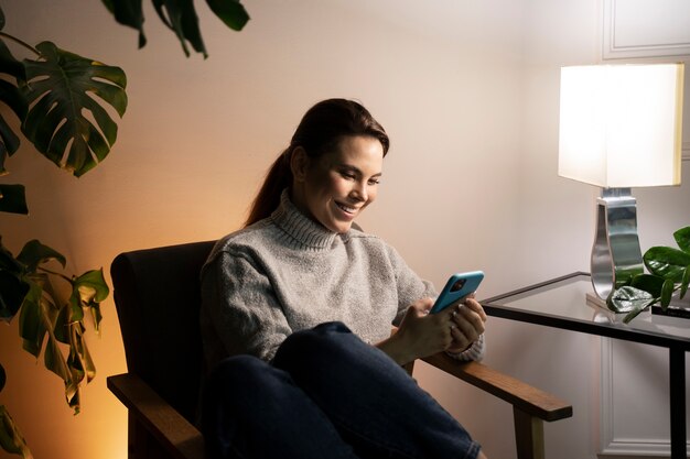 Woman using smartphone as a habit