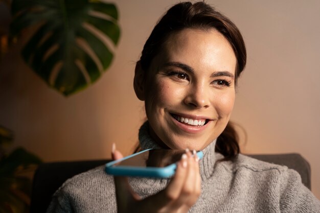 Woman using smartphone as a habit