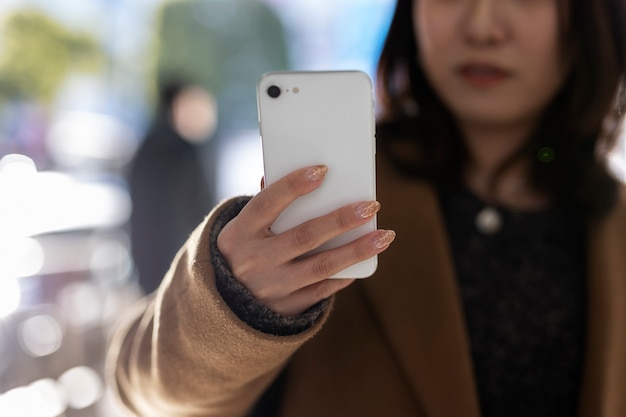 Woman using smartphone technology