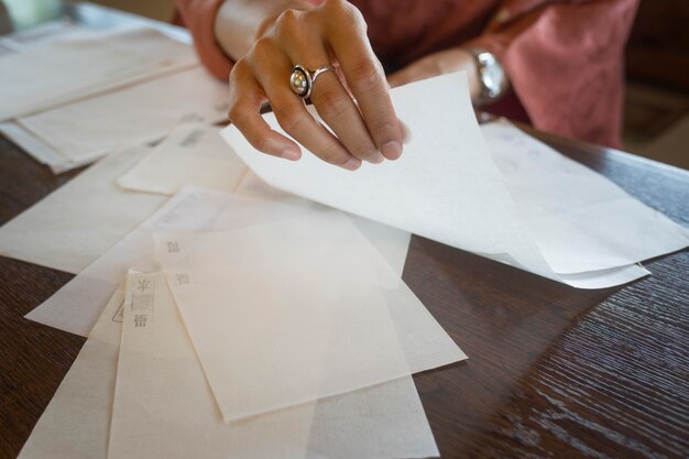 woman using special made paper for origami