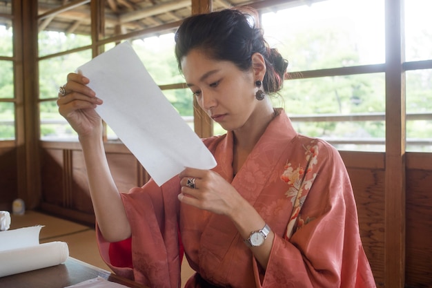 Woman using special made paper for origami