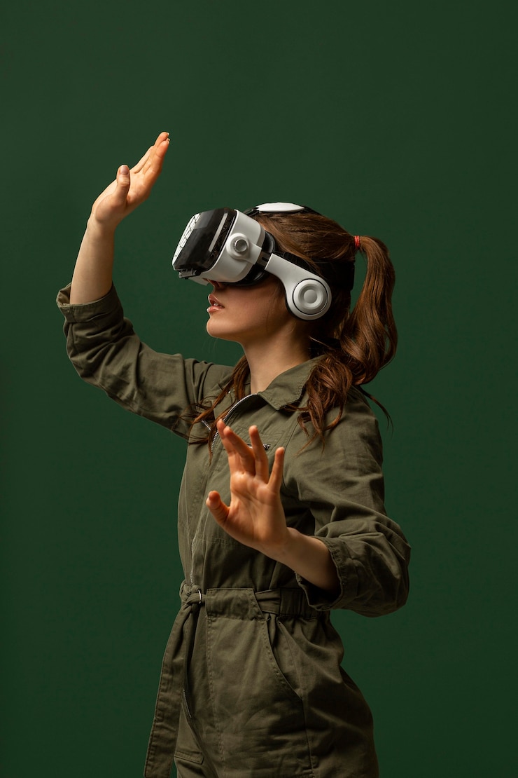 Free Photo woman using virtual reality goggles