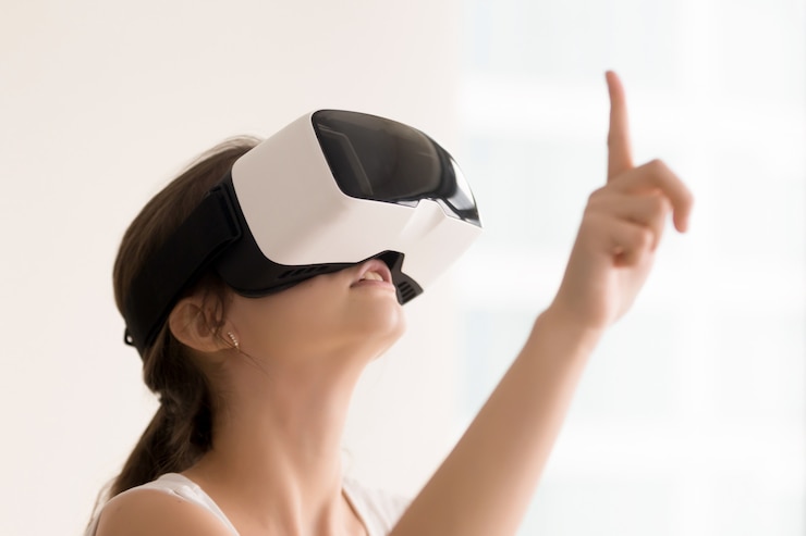 Free Photo woman using vr glasses for interactive videos