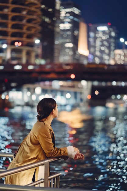 woman walking near Chicago river