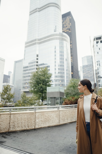 Free photo woman walks the streets of chicago