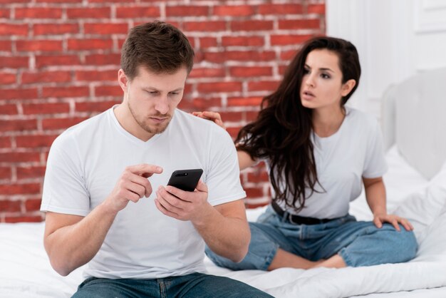 Woman wanting her boyfriend to pay attention to her