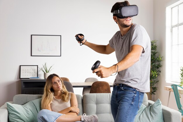 woman watching man play