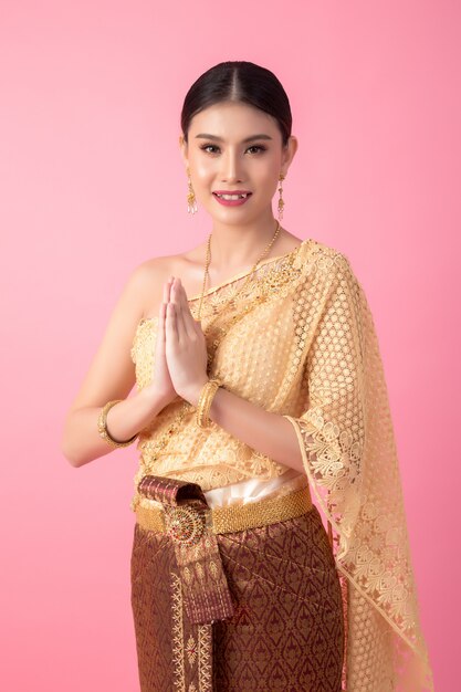 A woman wearing an ancient Thai dress