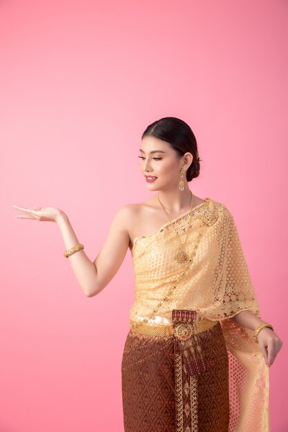 A woman wearing an ancient Thai dress