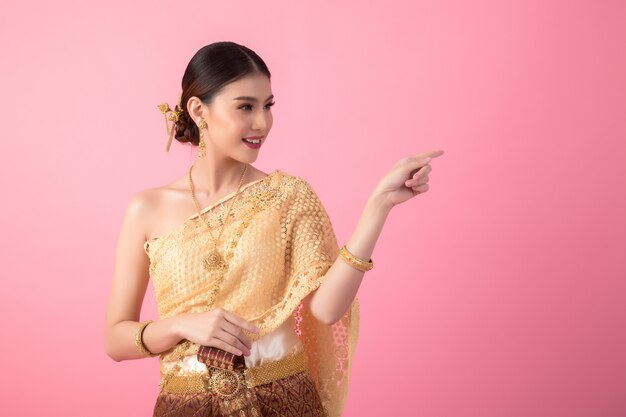 A woman wearing an ancient Thai dress
