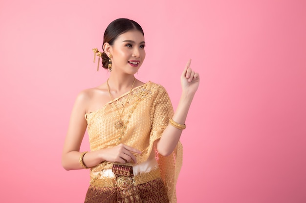 A woman wearing an ancient Thai dress