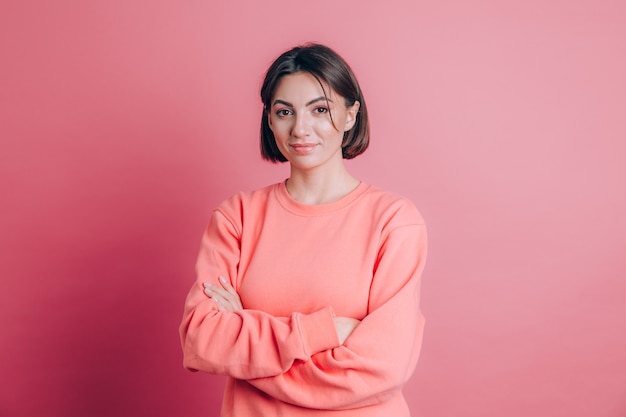 Woman wearing casual sweater on background  happy face smiling with crossed arms looking at the camera. Positive person.