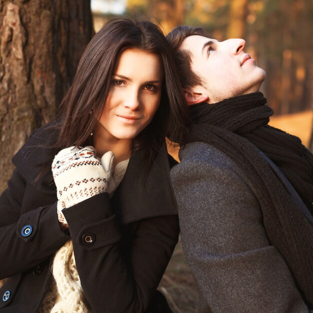 Woman wearing gloves posing with her boyfriend