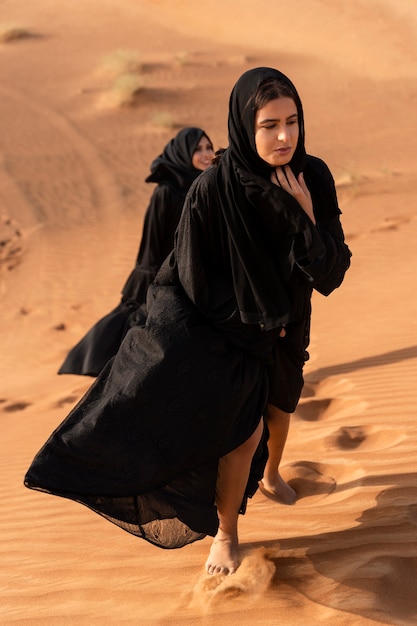 woman wearing hijab in the desert