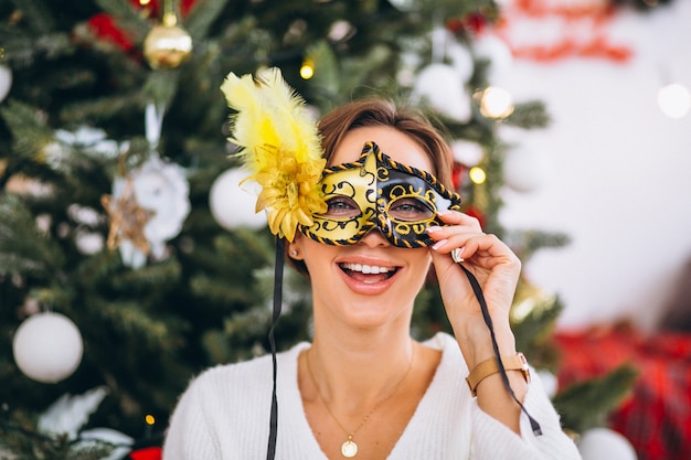 Woman wearing mask on Christmas