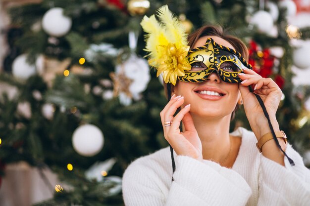 Woman wearing mask on Christmas