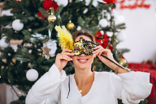 Woman wearing mask on Christmas