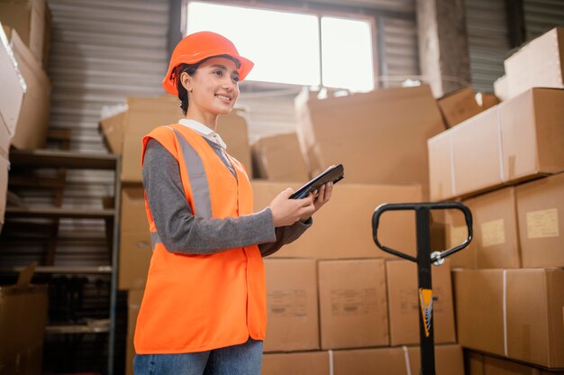 Woman wearing a safety cap at work