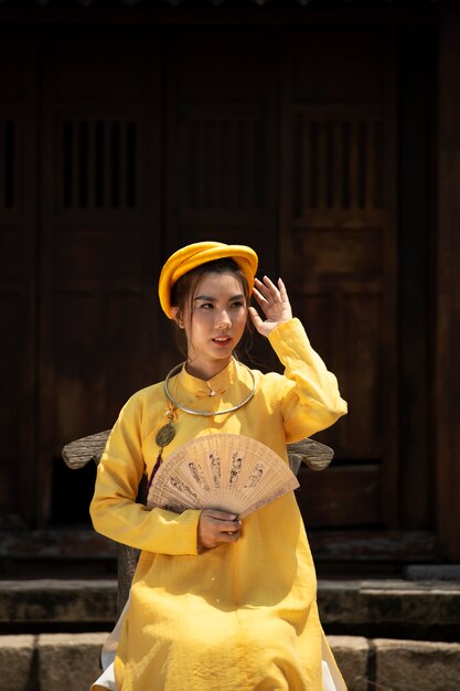 Woman wearing traditional ao dai clothing