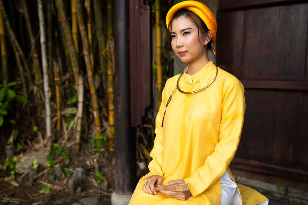 Woman wearing traditional ao dai clothing