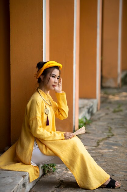 Woman wearing traditional ao dai clothing